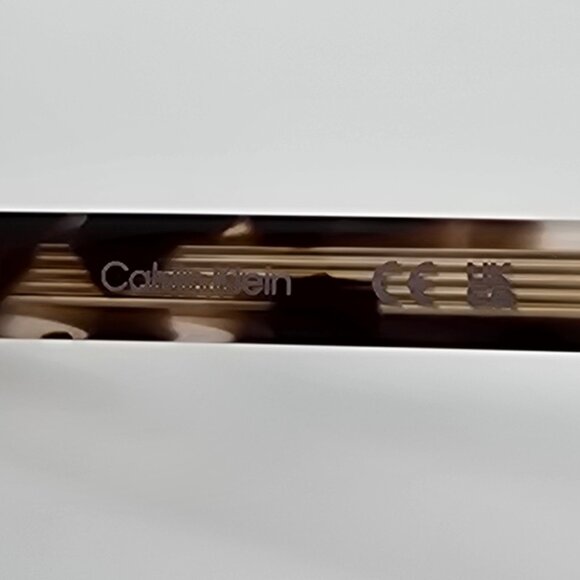 Calvin Klein CK21707S 111 Ivory Tortoise Frame Purple Gradient Lens Sunglasses - Picture 8 of 13